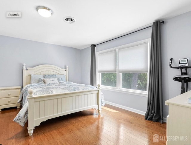 13 Crabtree Rd, Old Bridge, NJ 07747 - bedroom featuring wood finished floors and baseboards