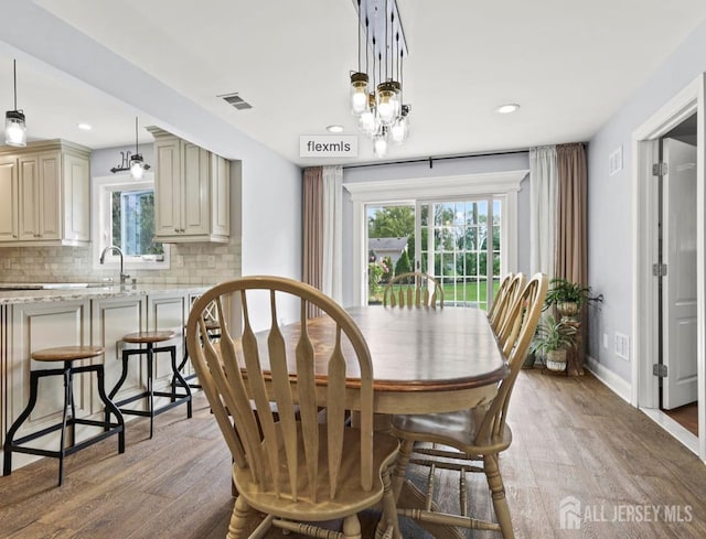 13 Crabtree Rd, Old Bridge, NJ 07747 - dining area featuring light wood-type flooring, recessed lighting, and baseboards