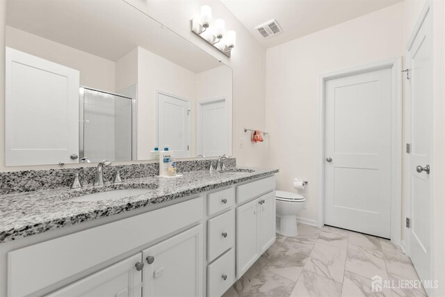70 Depot Way, Dunellen, NJ 08812 - full bath with marble finish flooring, double vanity, and a tile shower