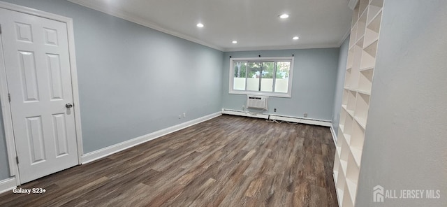 7 Lake Ave Unit Ia, East Brunswick, NJ 08816 - spare room with crown molding, baseboard heating, dark wood finished floors, recessed lighting, and baseboards