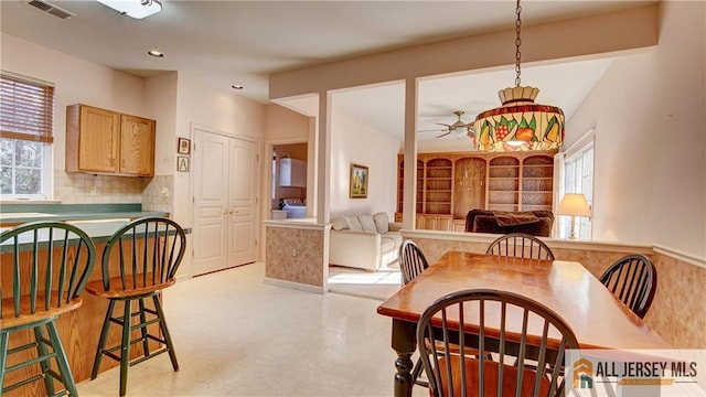 dining room featuring plenty of natural light, visible vents, recessed lighting, and a ceiling fan