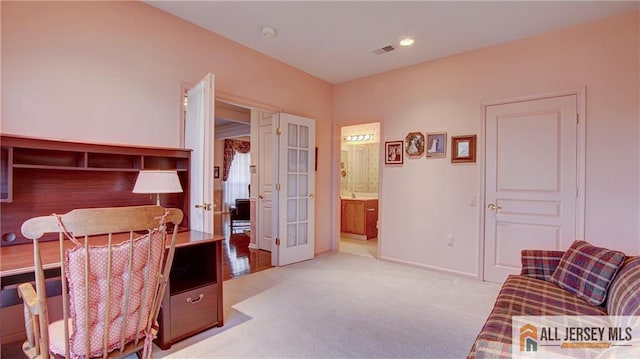 office with french doors, recessed lighting, light colored carpet, visible vents, and baseboards