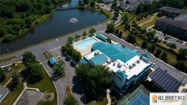 drone / aerial view with a water view