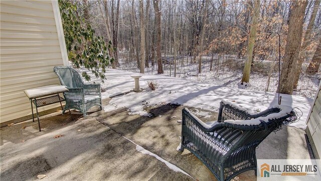 view of snow covered patio