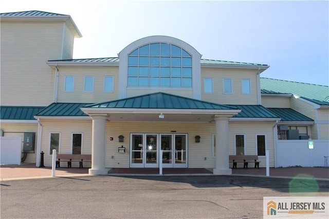view of building exterior with fence