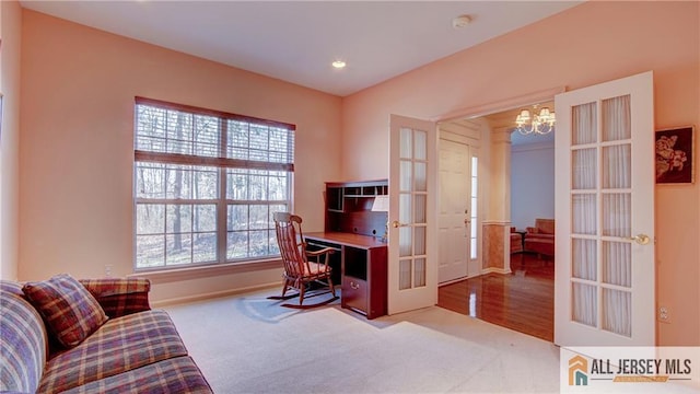 office space featuring carpet, baseboards, recessed lighting, an inviting chandelier, and french doors