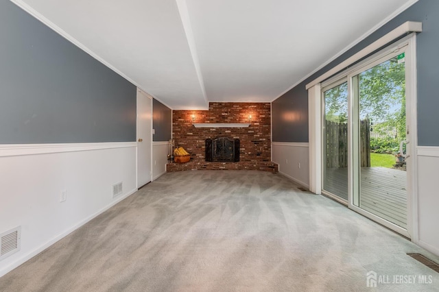 104 Laurel Ave, South Plainfield, NJ 07080 - unfurnished living room featuring a fireplace, carpet flooring, wainscoting, and ornamental molding
