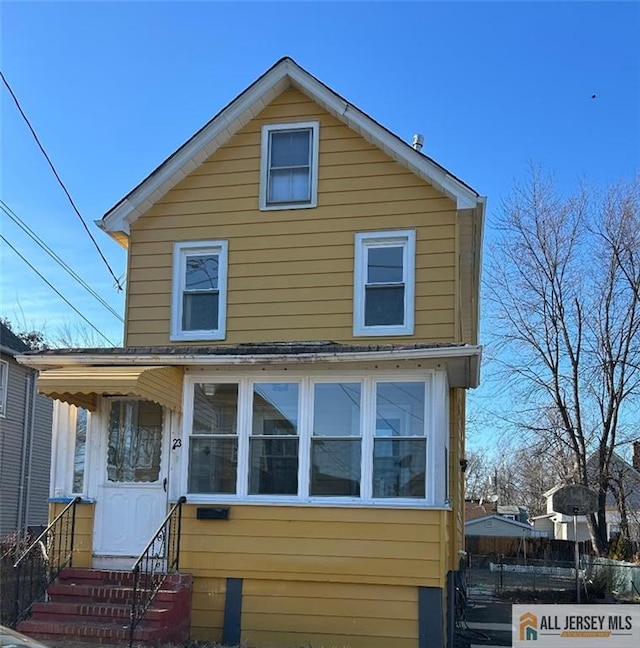 23 June St, South River, NJ 08882 - rear view of property featuring entry steps and fence