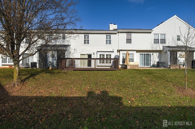 277 Edgeware Ct, Franklin, NJ 08873 - rear view of property featuring a chimney, a wooden deck, and a lawn