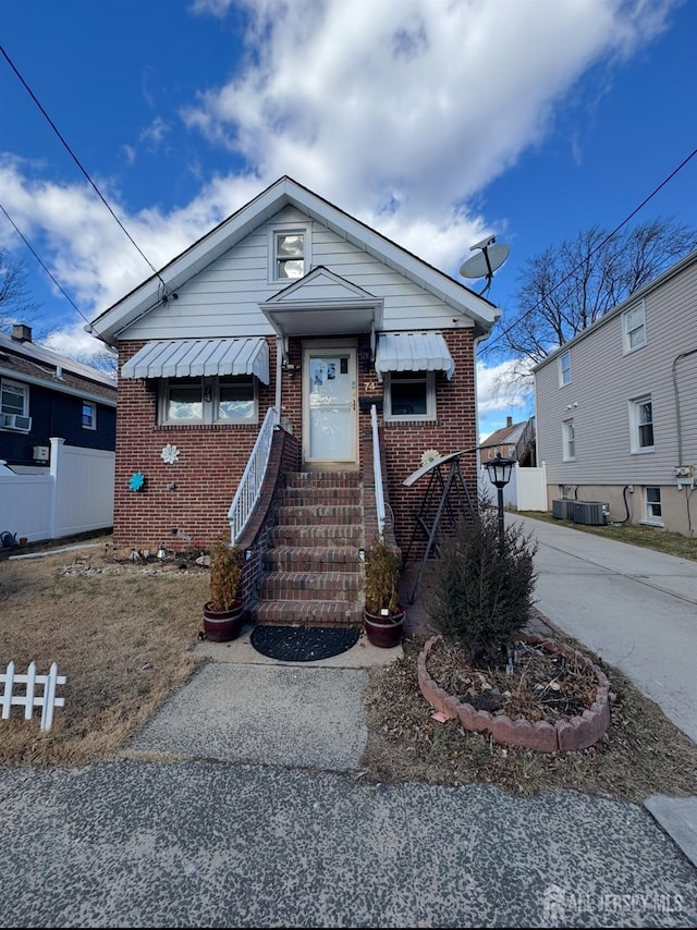 74 Spring St, Woodbridge Proper, NJ 07095 - view of front facade featuring entry steps and brick siding