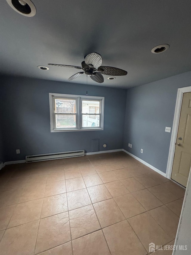 74 Spring St, Woodbridge Proper, NJ 07095 - empty room with a baseboard heating unit, ceiling fan, light tile patterned floors, and recessed lighting
