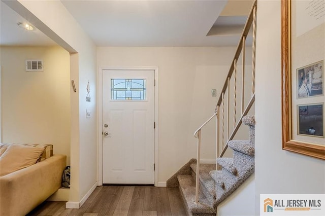 64 Netherwood Cir, Edison, NJ 08820 - entryway featuring wood finished floors and stairs