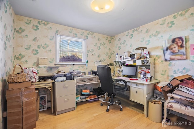 home office featuring wallpapered walls and light wood finished floors