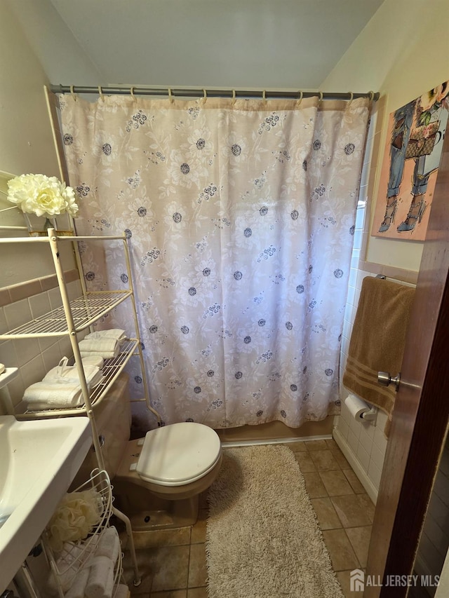 410 Harvard St, Piscataway, NJ 08854 - full bath with shower / bathtub combination with curtain, tile patterned flooring, and tile walls