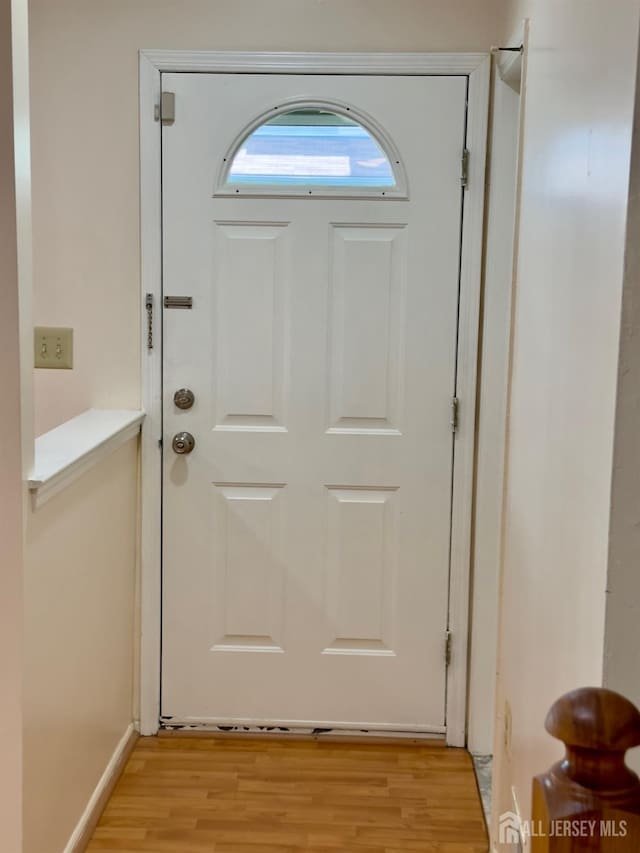 16 Sassafras Ct, North Brunswick, NJ 08902 - doorway with light wood-style flooring