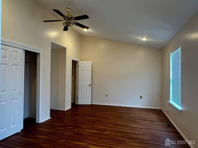16 Sassafras Ct, North Brunswick, NJ 08902 - unfurnished bedroom with wood finished floors, a closet, high vaulted ceiling, and a ceiling fan