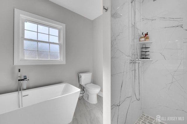 bathroom featuring a freestanding tub, a marble finish shower, toilet, and marble finish floor