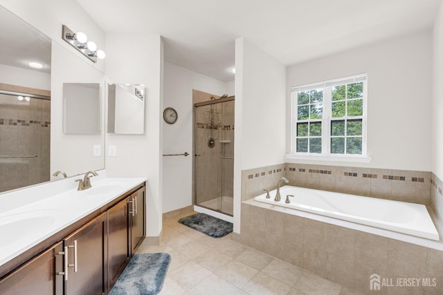 1206 Fir Ct, Franklin Twsp, NJ 08873 - full bath featuring a bath, a stall shower, tile patterned flooring, and double vanity