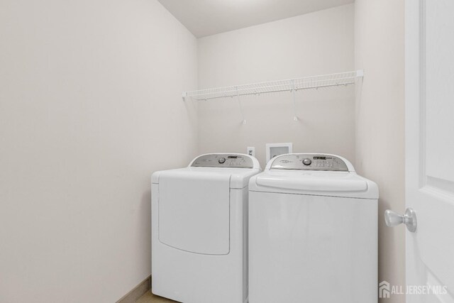 1206 Fir Ct, Franklin Twsp, NJ 08873 - washroom featuring washing machine and dryer