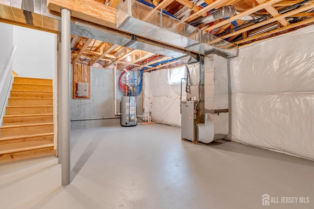 1206 Fir Ct, Franklin Twsp, NJ 08873 - unfinished basement featuring gas water heater, heating unit, and stairway