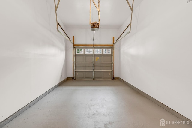 1206 Fir Ct, Franklin Twsp, NJ 08873 - garage with a garage door opener and baseboards