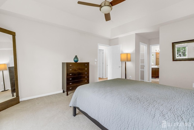 1206 Fir Ct, Franklin Twsp, NJ 08873 - bedroom with light carpet, ceiling fan, and ensuite bath