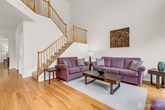 1206 Fir Ct, Franklin Twsp, NJ 08873 - living room with stairs, wood finished floors, and a high ceiling