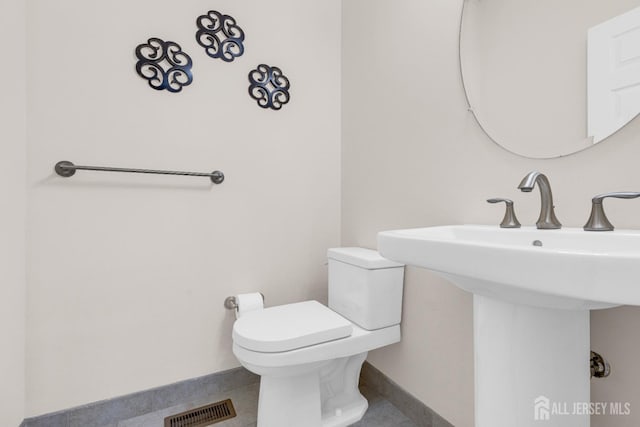 1206 Fir Ct, Franklin Twsp, NJ 08873 - bathroom with toilet and baseboards