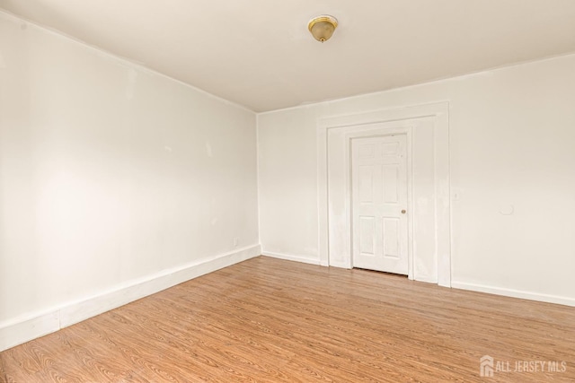 107 N 16th St N, East Orange, NJ 07017 - empty room with light wood-type flooring and baseboards