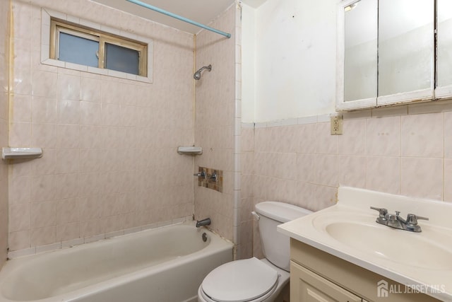 107 N 16th St N, East Orange, NJ 07017 - bathroom with toilet, shower / washtub combination, tile walls, and vanity