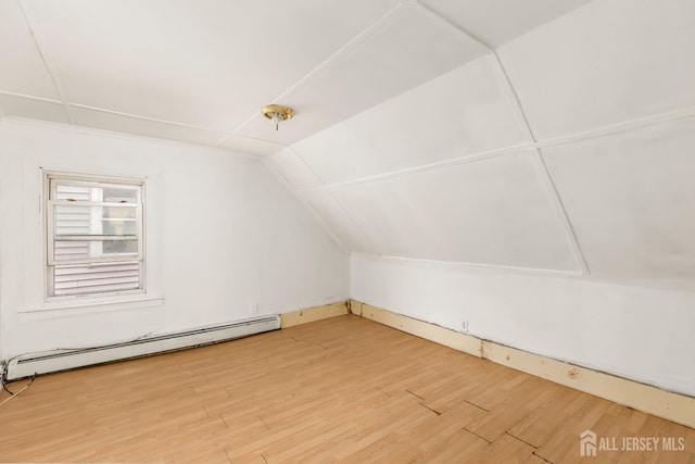 107 N 16th St N, East Orange, NJ 07017 - bonus room with a baseboard radiator, wood finished floors, and vaulted ceiling
