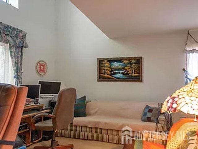 29 Jeffrey Cir S, Brunswick, NJ 08810 - carpeted office featuring a towering ceiling