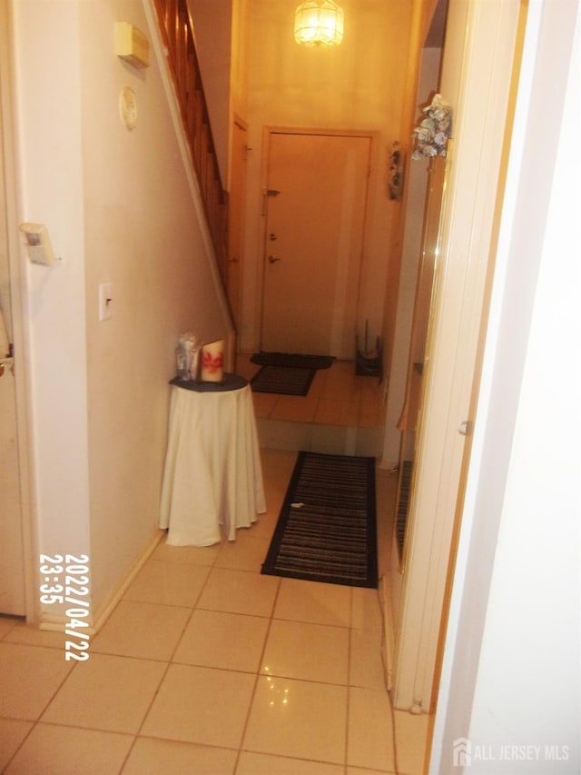 29 Jeffrey Cir S, Brunswick, NJ 08810 - hall with light tile patterned floors and stairway