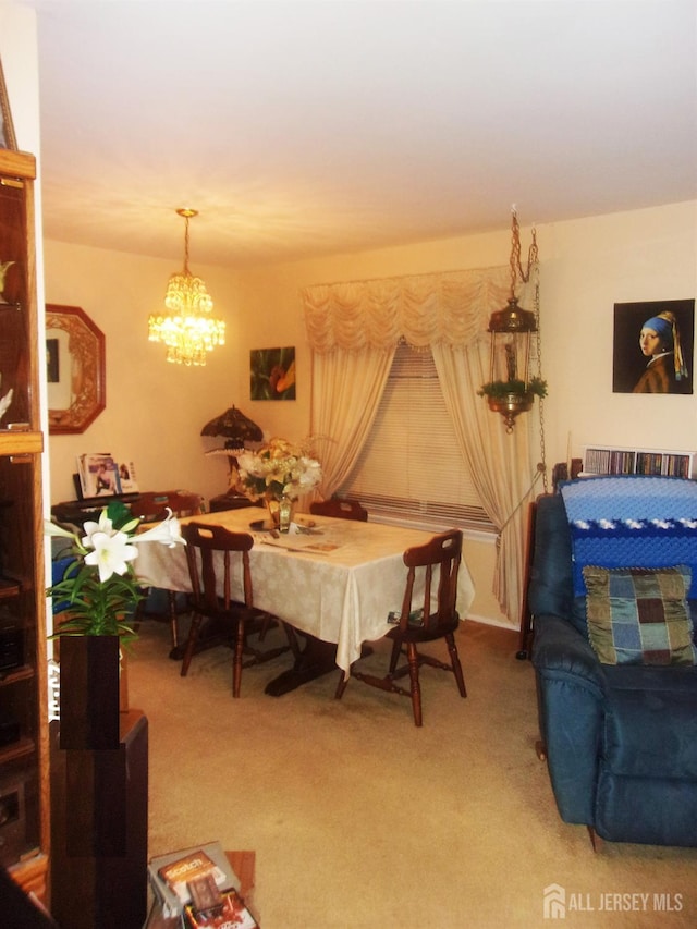 29 Jeffrey Cir S, Brunswick, NJ 08810 - dining room featuring a chandelier and light colored carpet