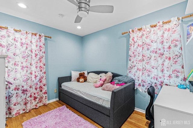 bedroom with recessed lighting, baseboards, ceiling fan, and wood finished floors