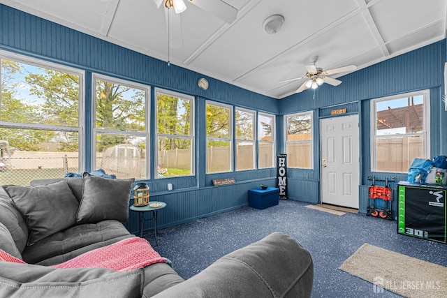 sunroom / solarium featuring an outdoor living space and a ceiling fan