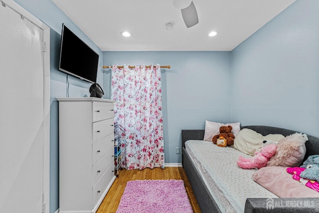 bedroom featuring recessed lighting, ceiling fan, and wood finished floors