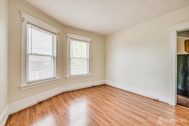 151 N Broadway N, South Amboy, NJ 08879 - empty room with ornamental molding, light wood finished floors, and baseboards