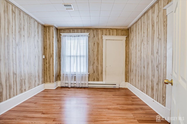 151 N Broadway N, South Amboy, NJ 08879 - spare room featuring wood finished floors, crown molding, wooden walls, and baseboards