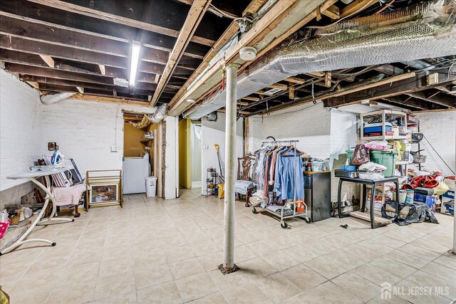 151 N Broadway N, South Amboy, NJ 08879 - unfinished basement featuring washer / dryer