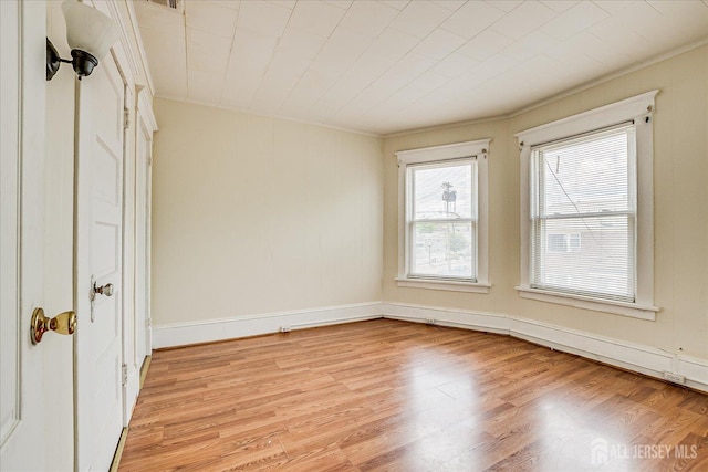 151 N Broadway N, South Amboy, NJ 08879 - unfurnished room with light wood-style floors and crown molding