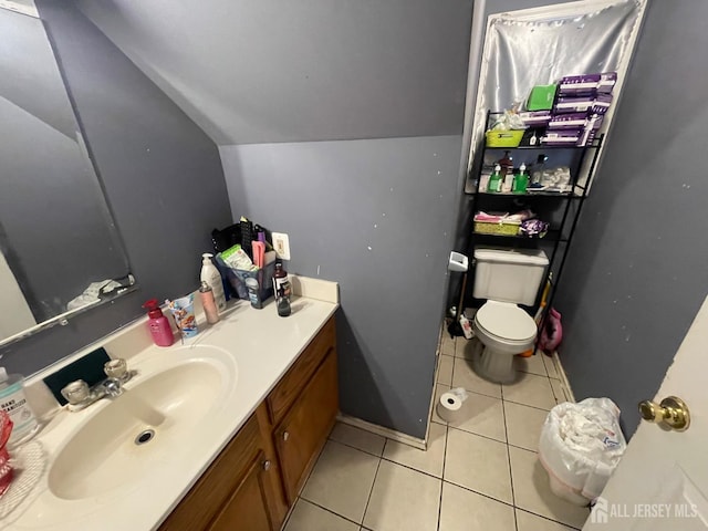 83 Throop Ave, New Brunswick, NJ 08901 - bathroom featuring vaulted ceiling, tile patterned floors, and vanity