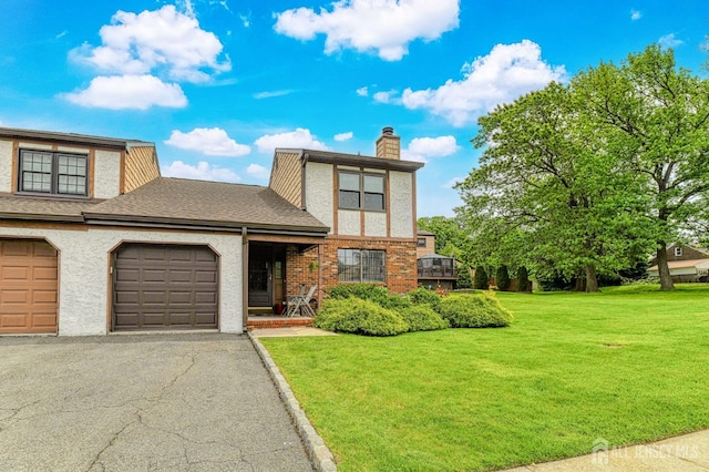 21 Wellington Ct, Sayreville, NJ 08872 - tudor house with driveway, a front lawn, a chimney, and an attached garage