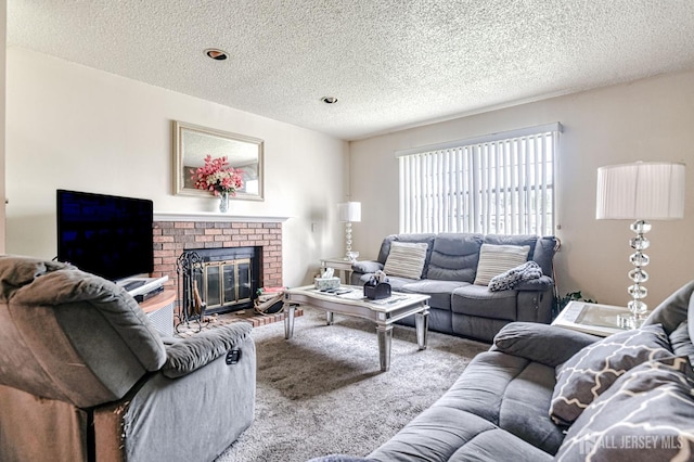 21 Wellington Ct, Sayreville, NJ 08872 - carpeted living area featuring a textured ceiling and a fireplace