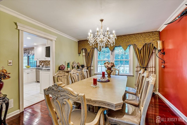 10 Dellview Dr, Edison, NJ 08820 - dining room with a chandelier, hardwood / wood-style floors, and crown molding