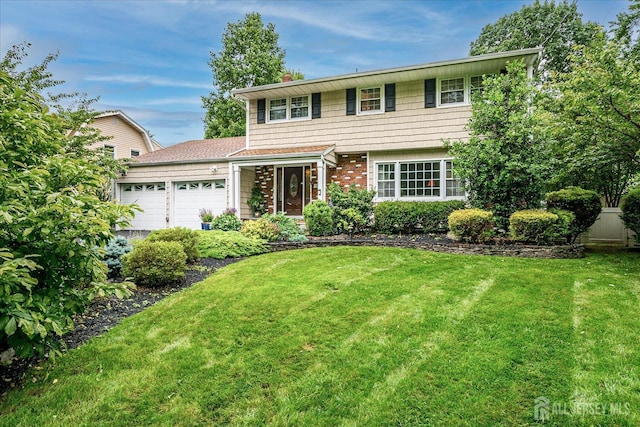 10 Dellview Dr, Edison, NJ 08820 - view of front of house featuring a garage and a front yard