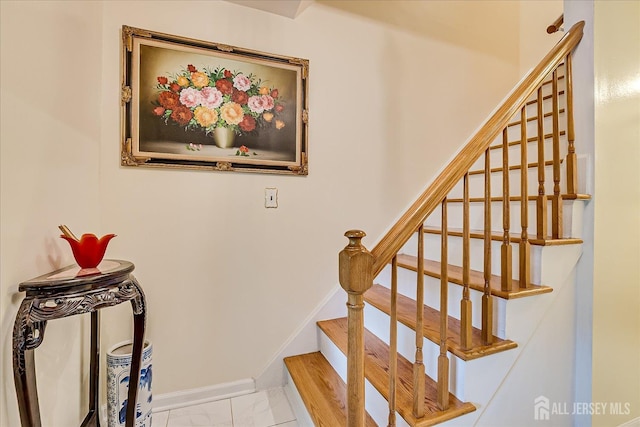 10 Dellview Dr, Edison, NJ 08820 - stairway with marble look tiles and baseboards