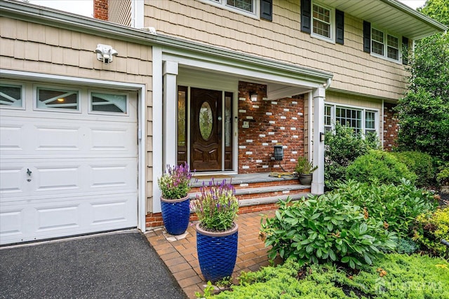 10 Dellview Dr, Edison, NJ 08820 - entrance to property with an attached garage, brick siding, and a porch