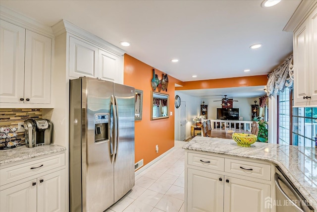 10 Dellview Dr, Edison, NJ 08820 - kitchen with appliances with stainless steel finishes, tasteful backsplash, white cabinetry, ceiling fan, and recessed lighting