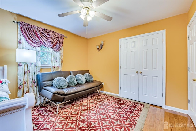 10 Dellview Dr, Edison, NJ 08820 - living room with a ceiling fan and light wood-style floors